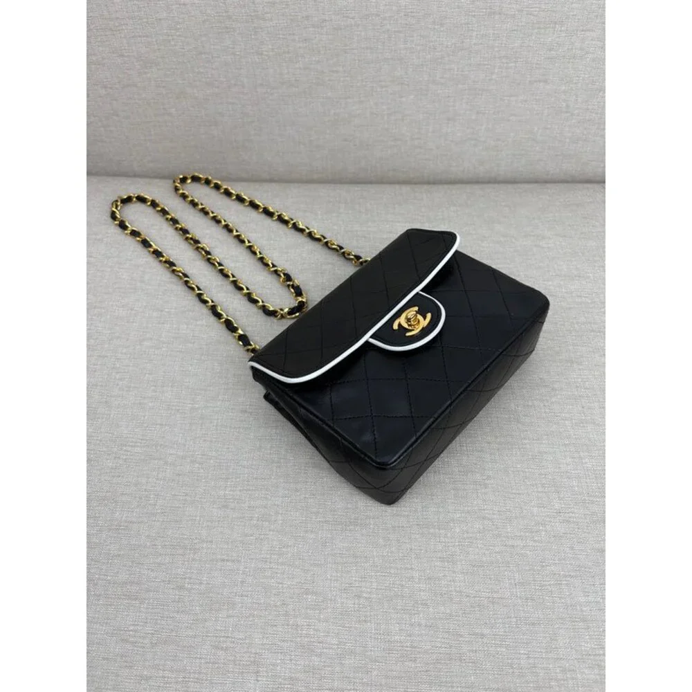 CHANEL Black Lambskin Mini Square Flap Bag White Trim GHW